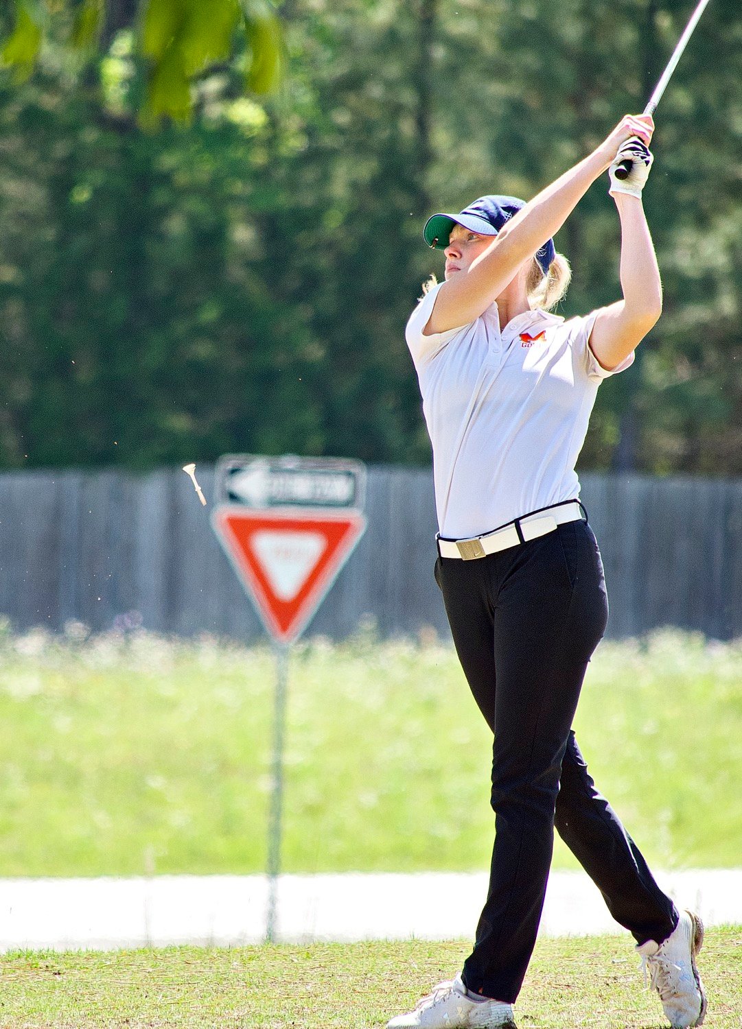 Ava Johnson drives the ball way down the 13th hole, leaving a short second to card an easy par on her way to an opening 88 on Monday. [see more shots]